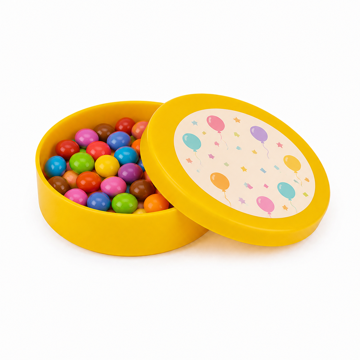 Yellow mini plastic favour tin filled with colourful sweets, with a decorated matching lid on a white background