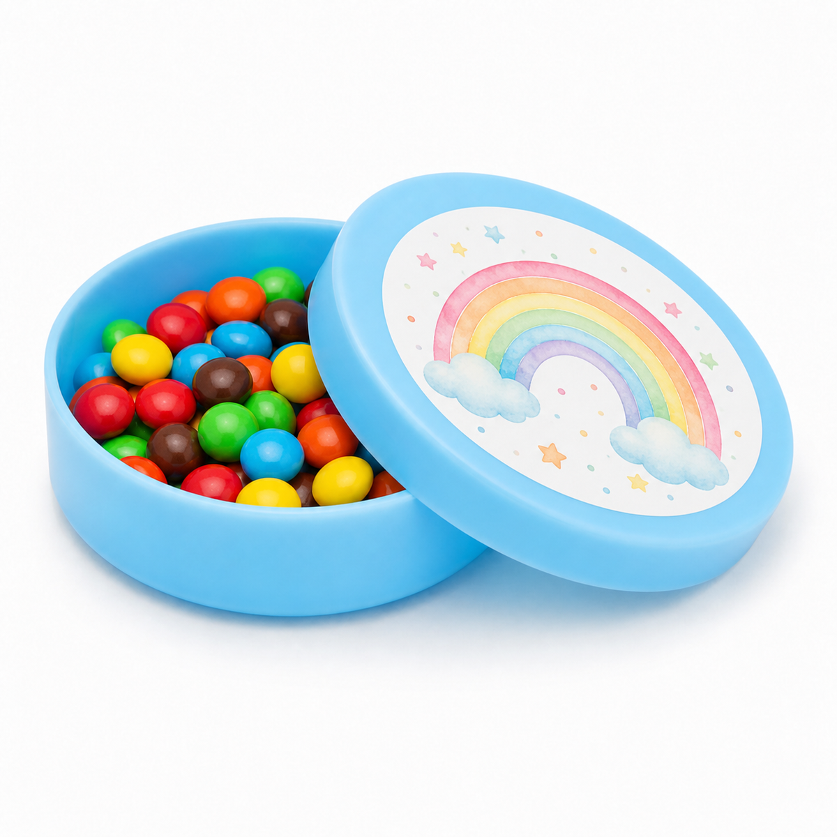 Light blue mini plastic favour tin filled with colourful sweets, with a rainbow decorated matching lid on a white background