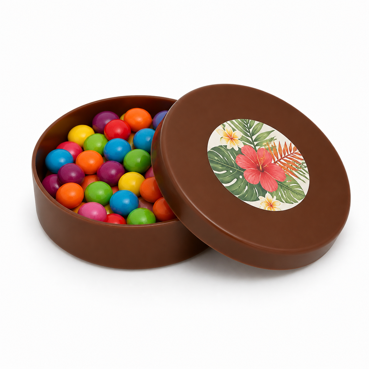 Brown mini plastic favour tin filled with colourful sweets, with a tropical decorated matching lid on a white background
