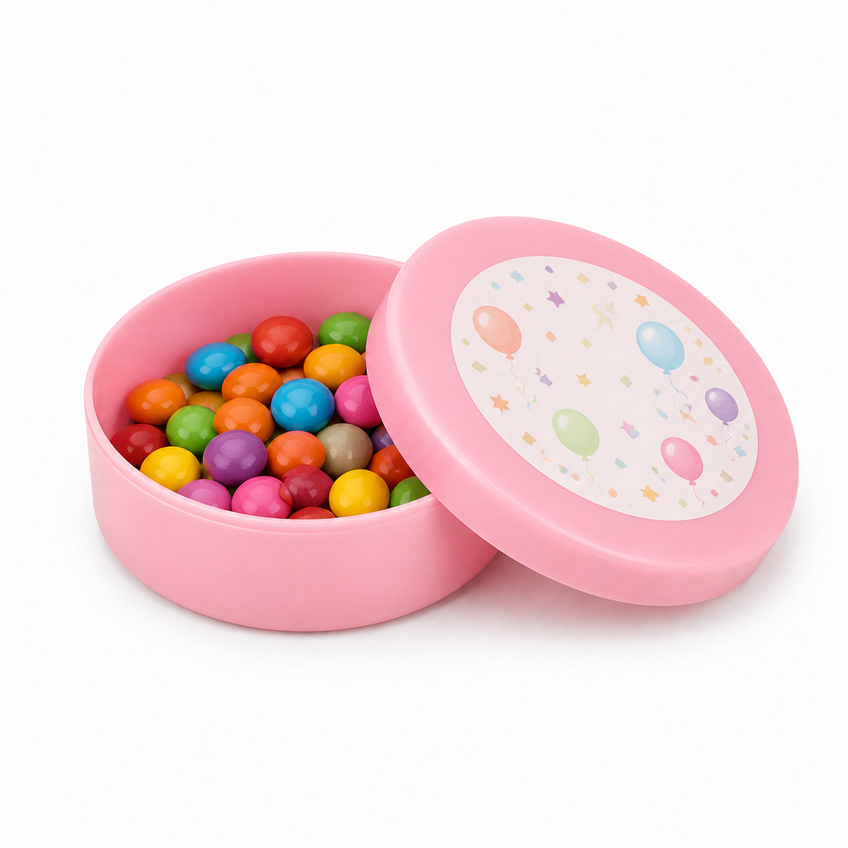 Light pink mini plastic favour tin filled with colourful sweets, with a decorated matching lid on a white background